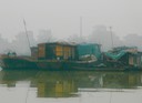 house boat in fog